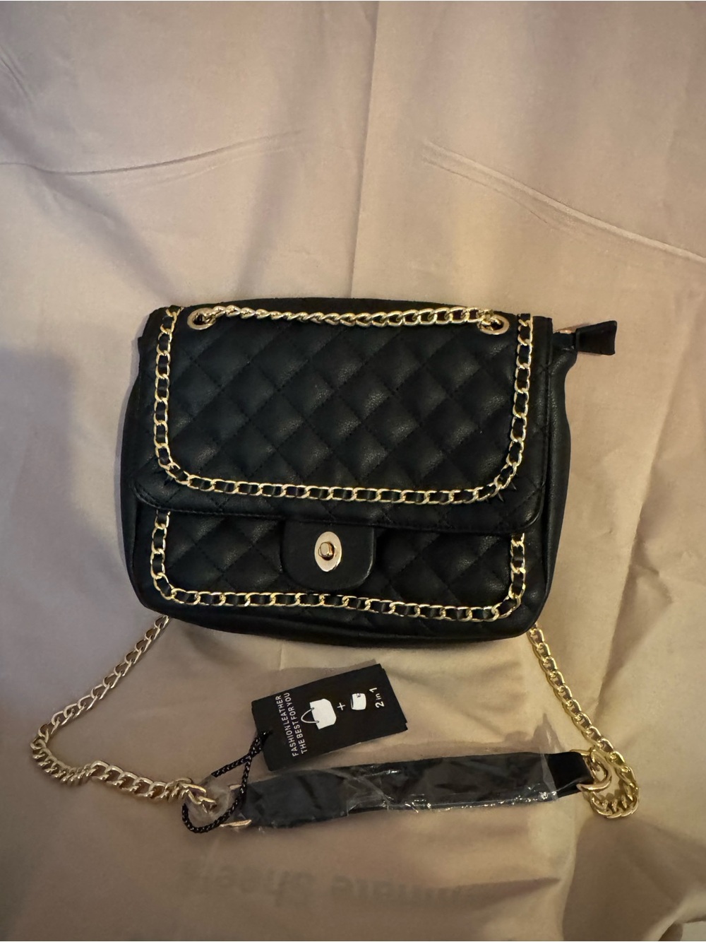 Quilted Black Shoulder Bag with Gold Chain Trim